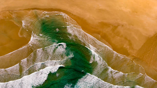 istock Beautiful aerial view of a beach with waves 1187351010
