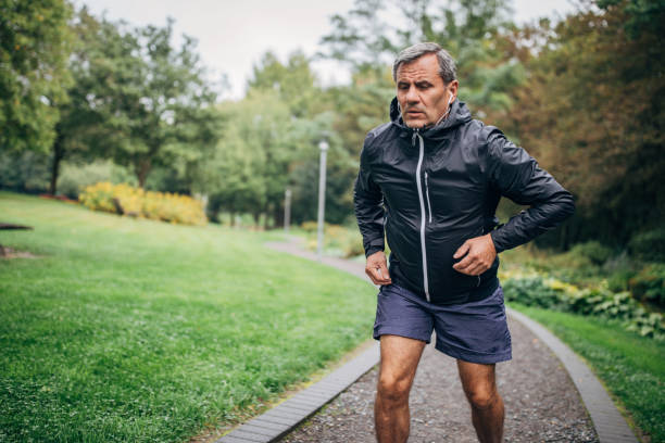 istock Senior businessman doing morning jogging 1187352365