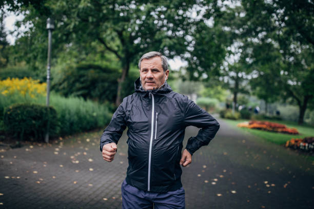 istock Senior businessman doing morning jogging 1187352387