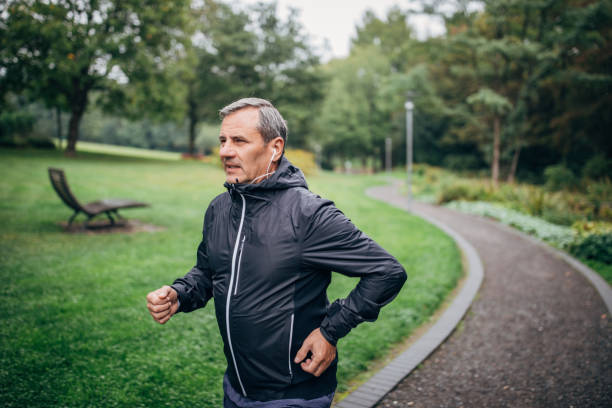 istock Senior businessman doing morning jogging 1187352394