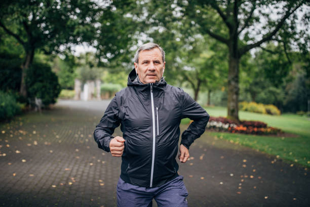 istock Senior businessman doing morning jogging 1187352406