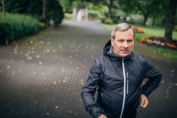 istock Senior businessman doing morning jogging 1187352413