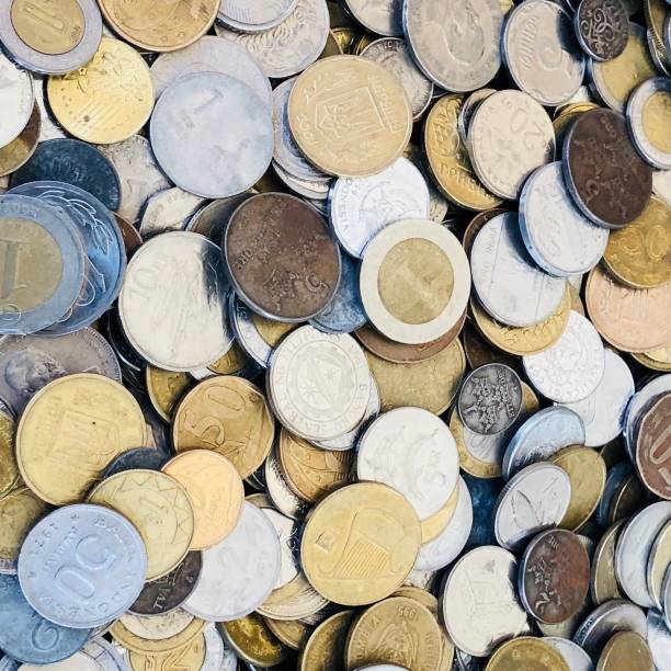 istock money - old coins on an antique stall 1187354850