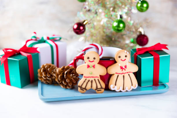 istock Gingerbread couple on white background 1187355729