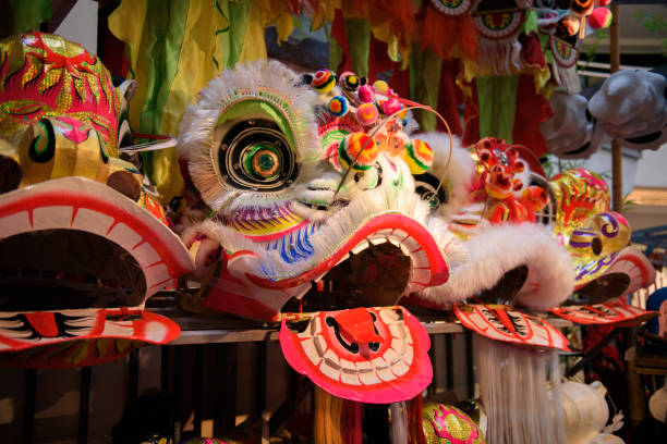 istock Group of unfinished lion head in making for lion dance 1187357746
