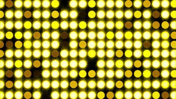 Photo of Computer generated bright flood lights background with round particles and gold glow. 3d rendering of disco backdrop