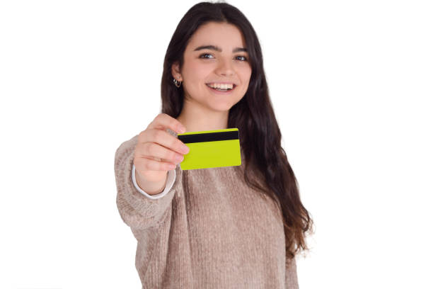 istock Woman holding credit card. 1187358351
