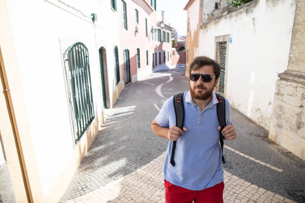 istock Man discovering beautiful Lisbon streets 1187359138