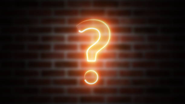 istock Question mark neon sign on a background of brickwork, computer generated. 3d rendering of wireframe symbol with glowing laser light 1187359817