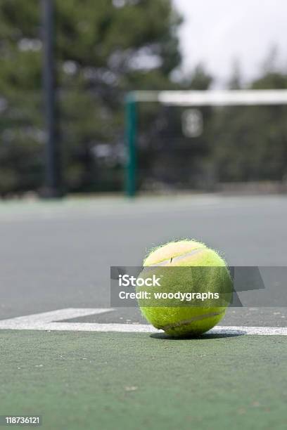 Closeup Of Tennis Ball On Base Line Stock Photo - Download Image Now - Asphalt, Baseline, Close-up