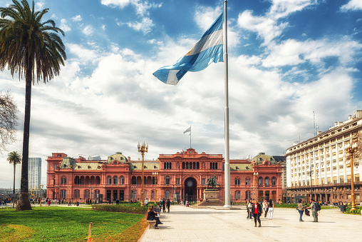 Buenos Aires, Argentina -  29 August 2019: A view of Casa Rosada, or Pink House, the office of President of Argentina. with landmark Plaza de Mayo, location of many historic and political events.