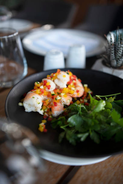 Seafood salad, with shrimp, lettuce, olives, knwon as \