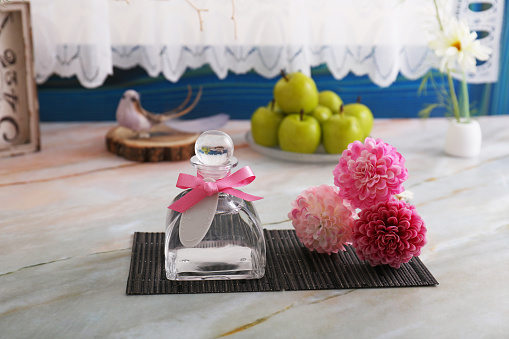 Bottle of perfume on the table