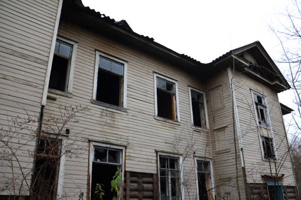 istock Old abandoned wooden mansion - Dilapidated building. 1187373533