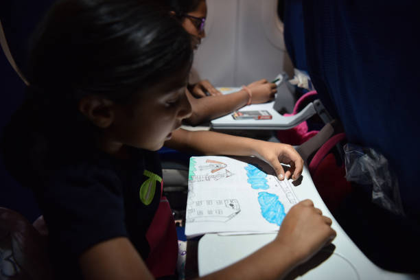istock Sisters drawing picture in the flight 1187373584