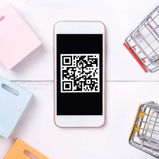 istock Abstract online shopping,mobile payment with QR code design concept element,colorful cart,paper bag on wooden table background,top view,flat lay 1187373920