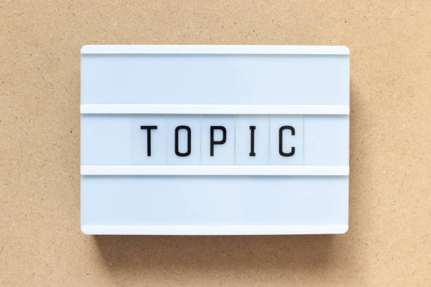 istock White lightbox with word topic on wood background 1187374148
