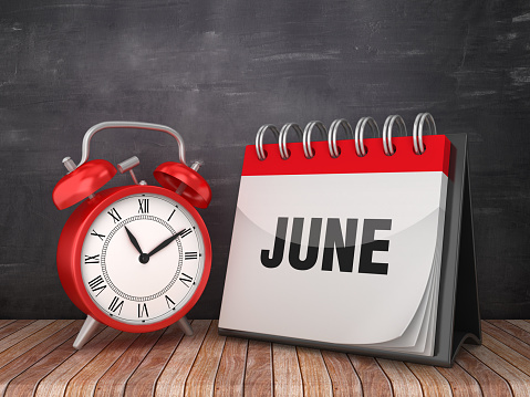 JUNE Calendar with Alarm Clock on Chalkboard Background - 3D Rendering