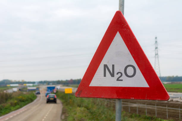 Nitrogen crisis in the netherlands Nitrogen oxide warning sign in front of a building site Nitrogen crisis in the netherlands nitrogen photos stock pictures, royalty-free photos & images