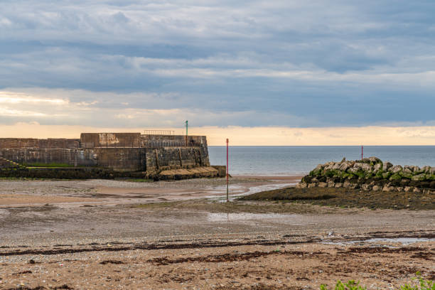 istock Harbour walls in Harrington, Cumbria, England 1187390360