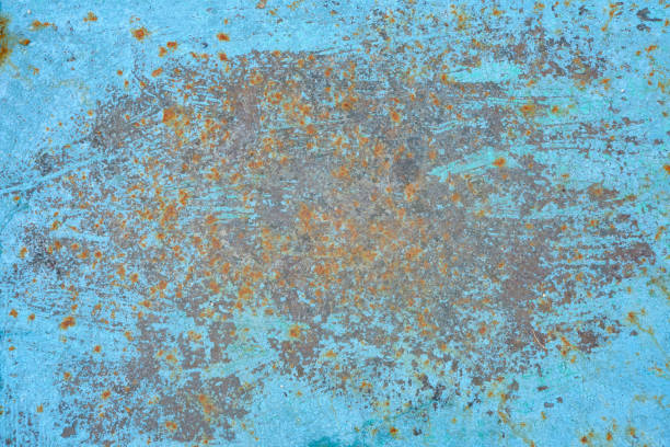 istock Texture of blue paint and rusty metal, background close-up 1187391178