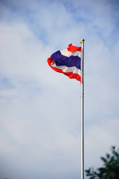 istock Thailand flag waving cloudy sky background 1187391478