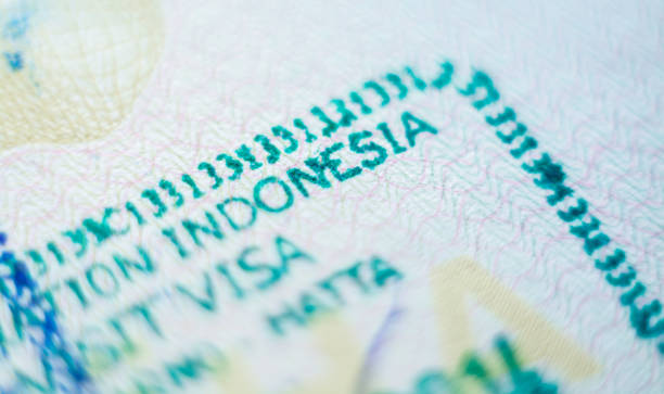 Close up of Indonesian country entrance stamp in passport stock photo