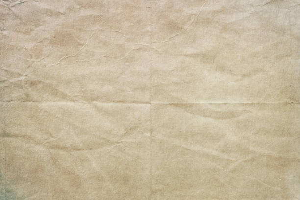 古いくしゃくしゃの紙の質感や背景 - textured effect scratched textured parchment ストックフォトと画像