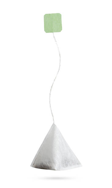 istock Close up of teabag on white with clipping path 1187396533