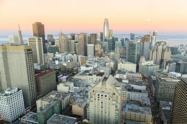 istock Sunset and moonrise over San Francisco Downtown. 1187400979