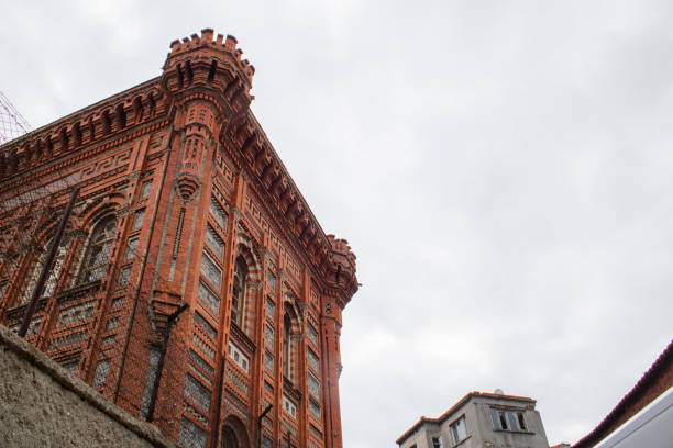 Istanbul, Turkey - October-16,2019: Balat rum high school old historical building. Unique architectural structure made of red colored bricks.