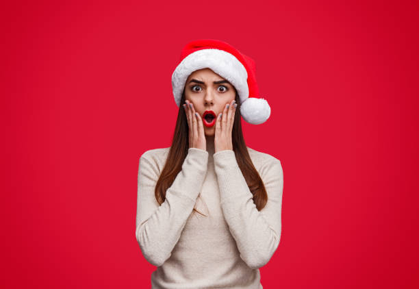 istock Shocked young lady celebrating Christmas 1187407015