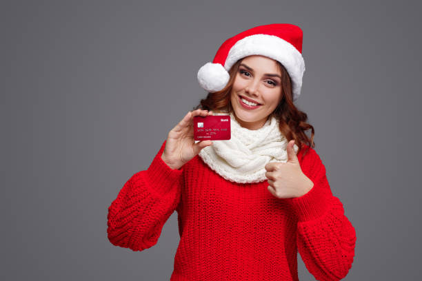 istock Glad client approving banking service on Christmas Day 1187407020