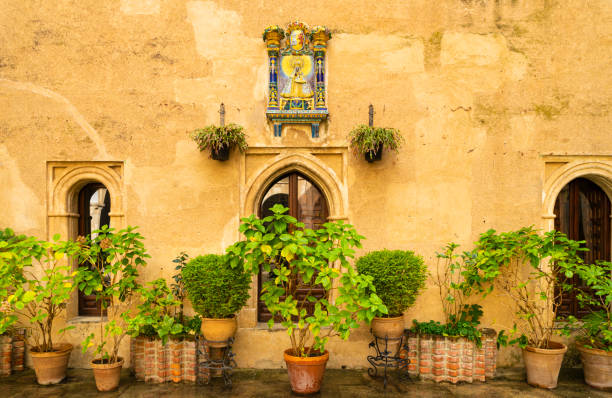 Courtyard in the monastery of Guadalupe in Caceres in Spain with an image of the Virgin Mary.