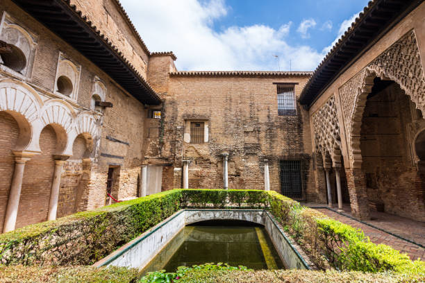patio del yeso courtyard in the royal alcázar palace in seville spain - seville alcazar palace sevilla arch fotografías e imágenes de stock