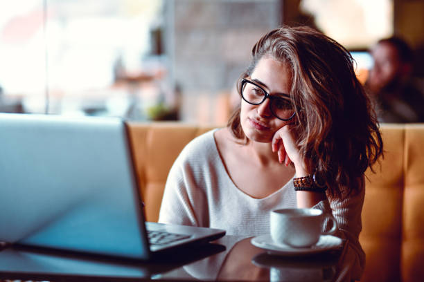 istock Female Freelancer Working And Enjoying Coffee 1187417282