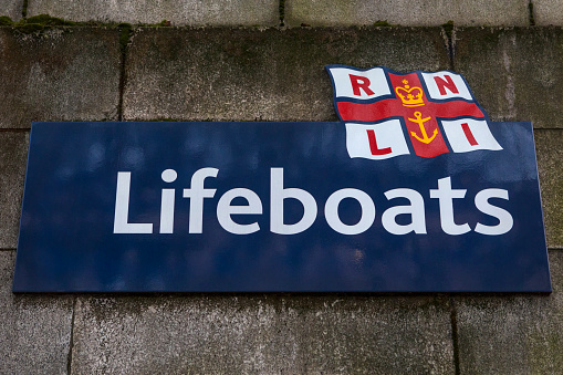 London, UK - February 26th 2019: An RNLI Lifeboats sign, along the River Thames in London, UK.
