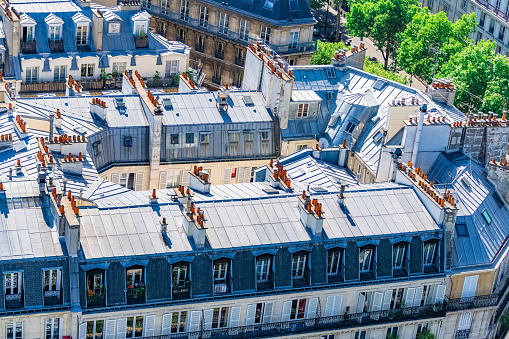 Paris, parisian roofs in a chic area, typical balcony and windows
