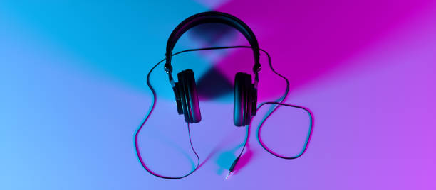 headphones on a black background close-up in neon light