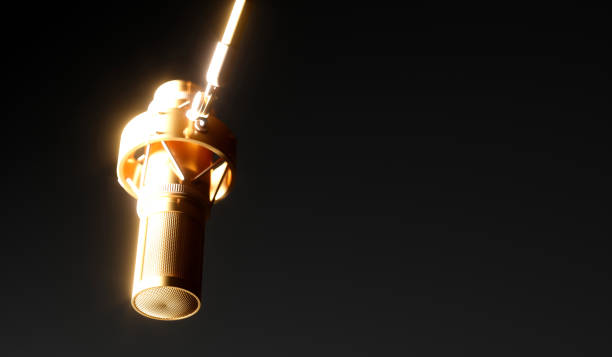 istock one shining golden microphone closeup 1187421443