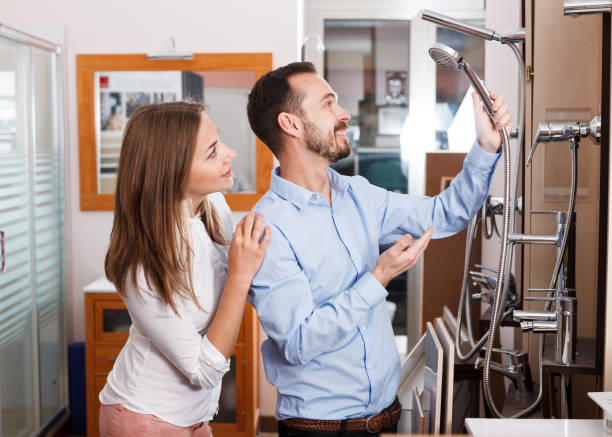 istock Couple looking for shower mixer 1187422124