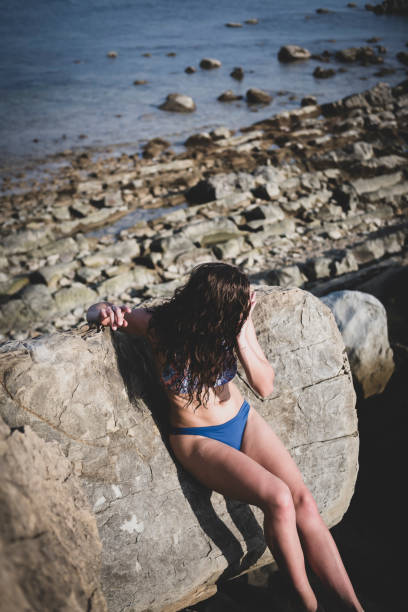 istock Laughing in sunshine at the beach 1187424619