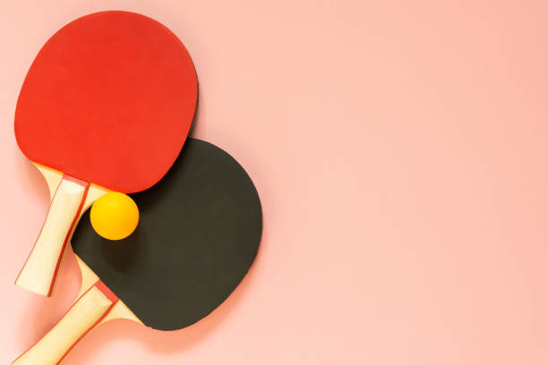 istock Tennis ping pong rackets with ball 1187426215