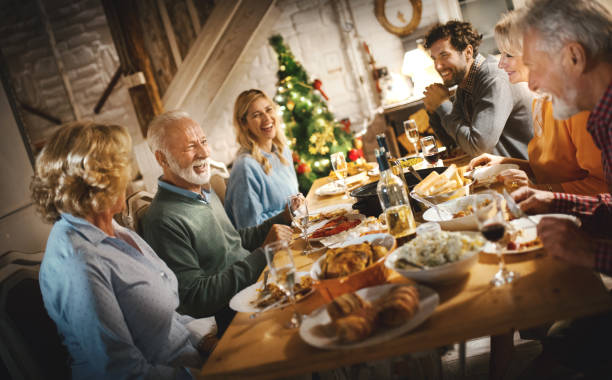 istock Family having Thanksgiving dinner. 1187427569