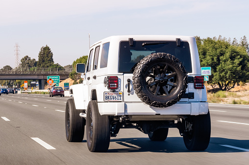 Oct 21, 2019 Palo Alto / CA / USA - Jeep vehicle driving on a freeway in San Francisco Bay Area