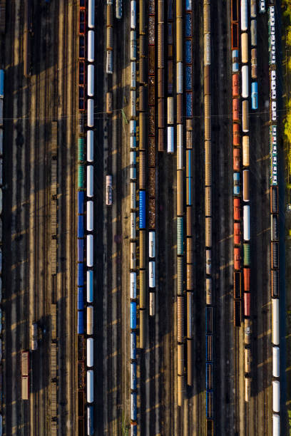 istock Top view of colorful cargo trains. 1187431484