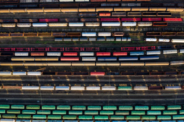 istock Top view of colorful cargo trains. 1187431489