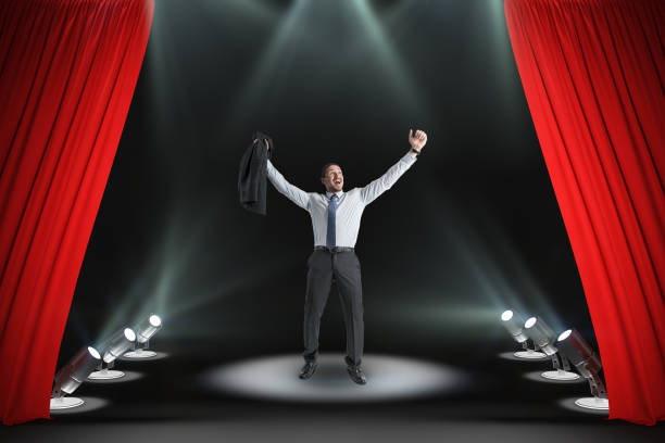 istock Happy businessman on stage 1187434095