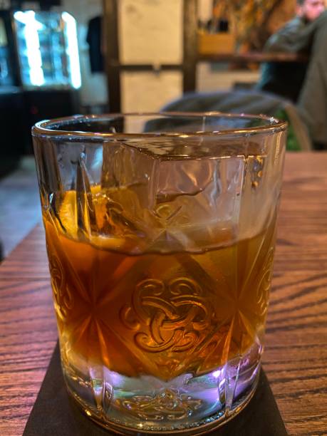 istock old fashion cocktail with a large square ice cube 1187435553