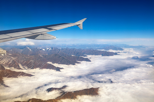 Flight over the Himalayan mountain range between Nepal and China.